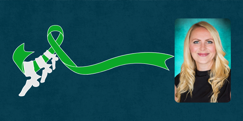 A picture of the green ribbon for scoliosis awareness